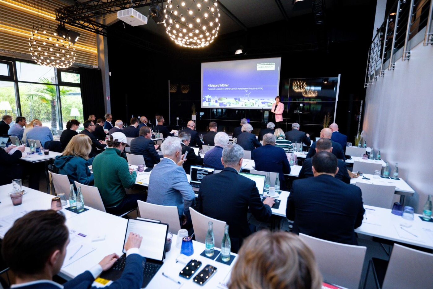 Hildegard Müller speaks at the IAA Transportation Media Summit before an audience.