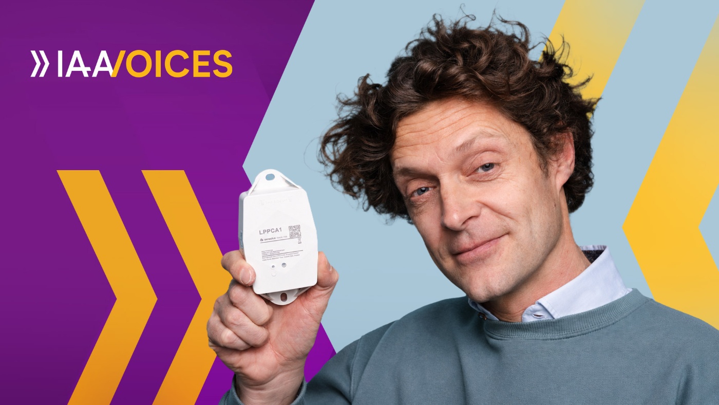 Kristoff Van Rattinghe holds an LPPCA1 device beside the IAA Voices logo.