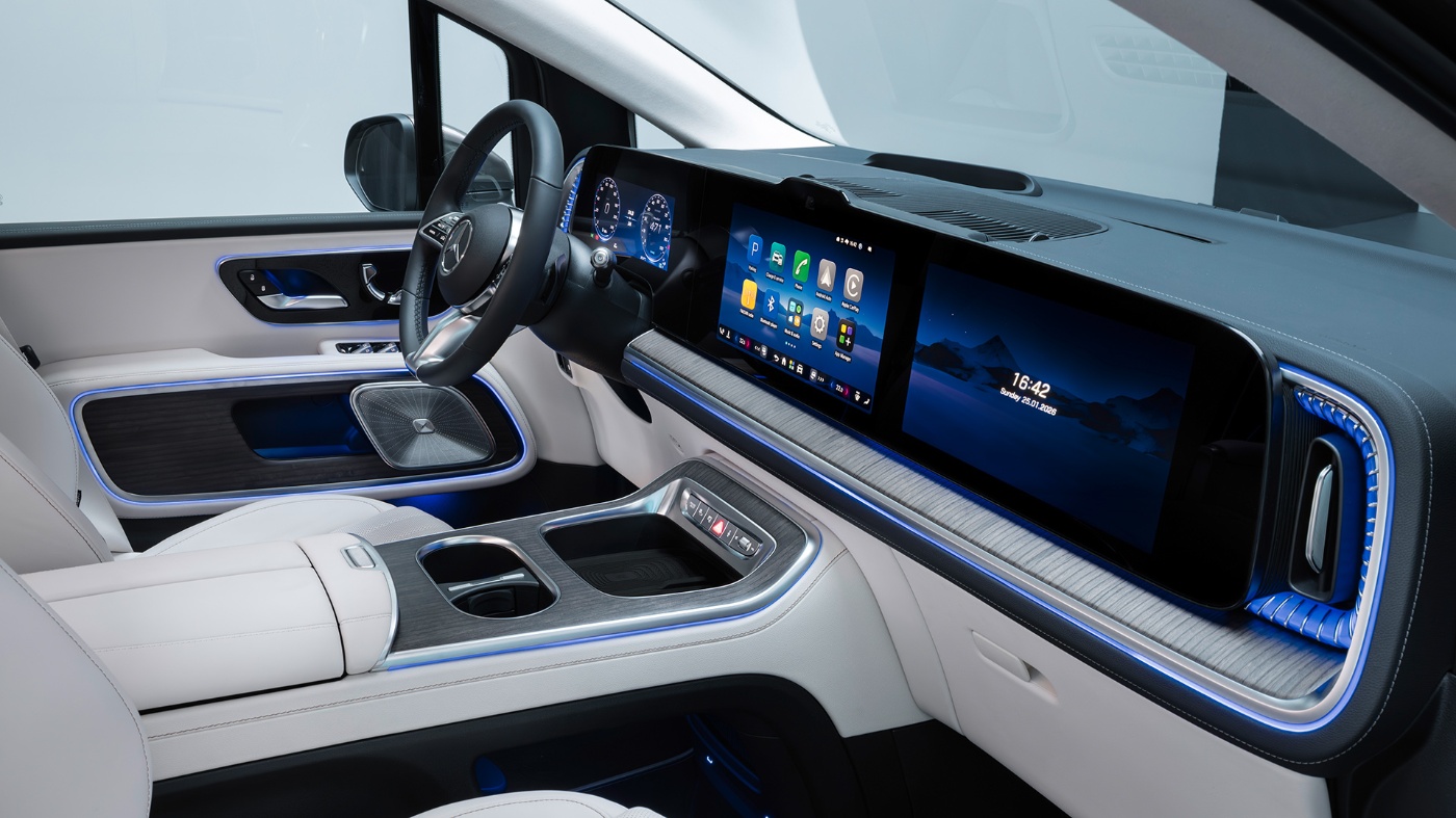 Mercedes-Benz interior with wide digital display and steering wheel.