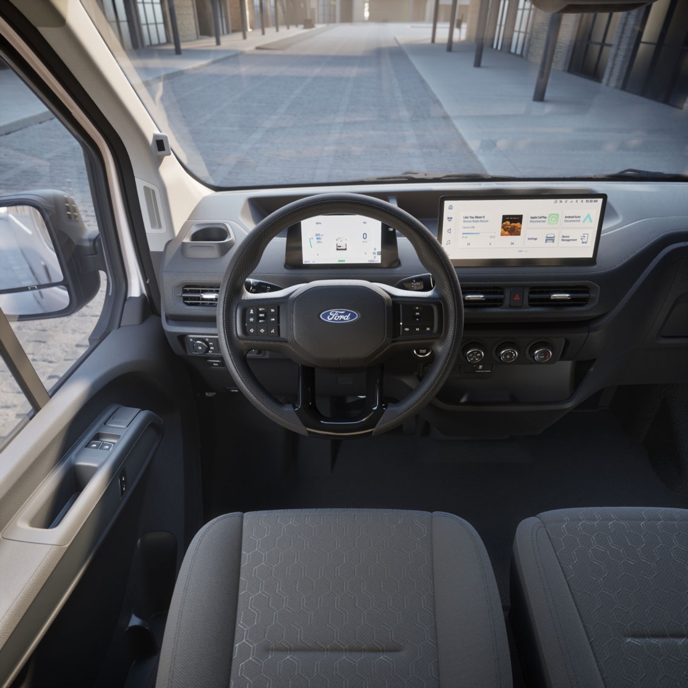 Interior view of a van with steering wheel and digital display