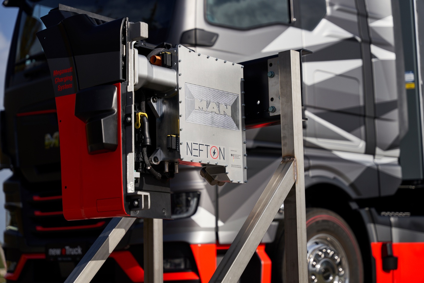 MAN Nefton megawatt charging system mounted in front of an electric truck.