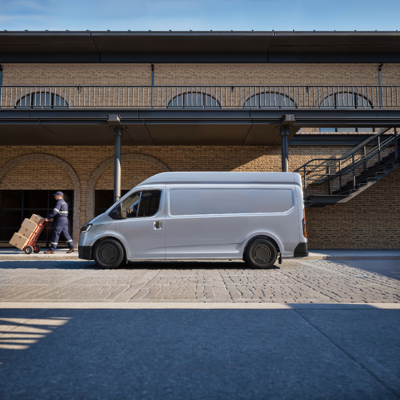 Ford Pro cargo van parked beside a historic building.