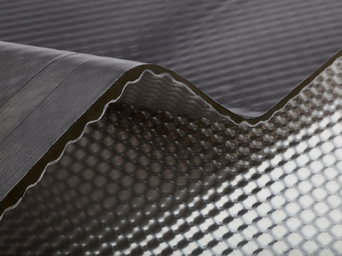 InsituCore composite panel with a textured surface shown in close-up.